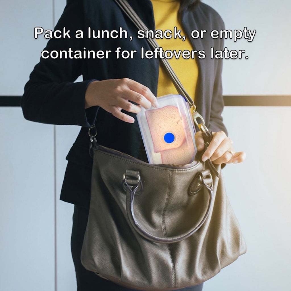 Girl placing small container in her purse for lunch later.